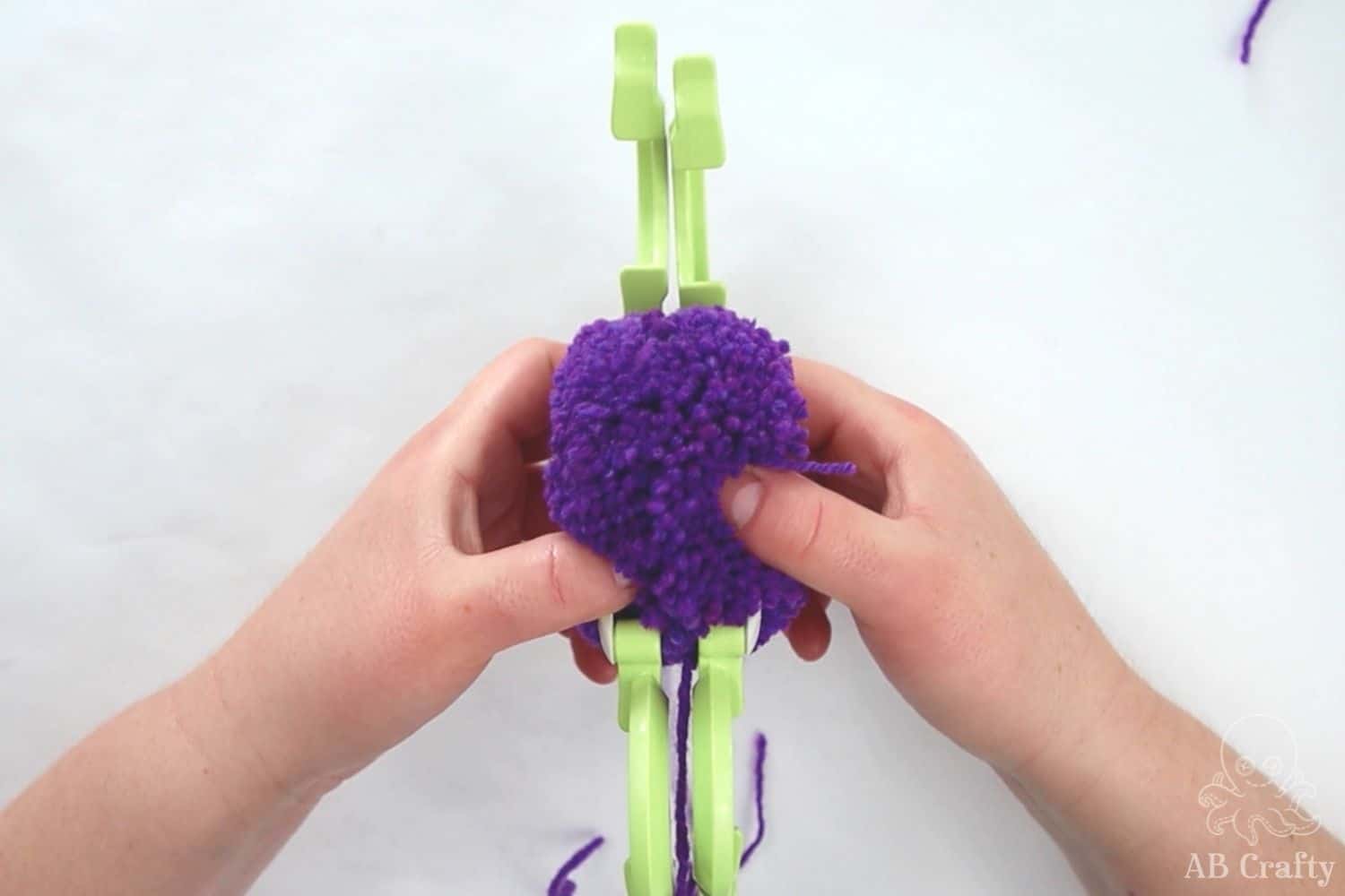 How to Make Yarn Pom Poms with a Pom Pom Maker - AB Crafty