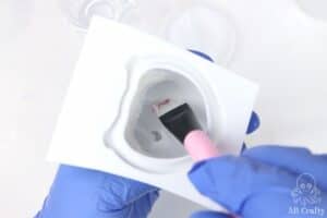 brushing vaseline into a silicone hamster taba squishy mold